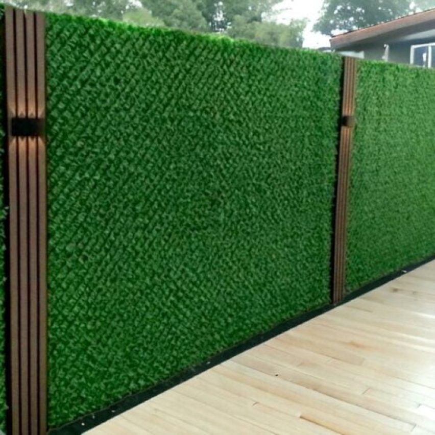 gallery dolce e1709982581533 qkyte2652un1ryw97edy7p2qsublebbs3719yjl6bs My Dolce Green grass fence on wood background